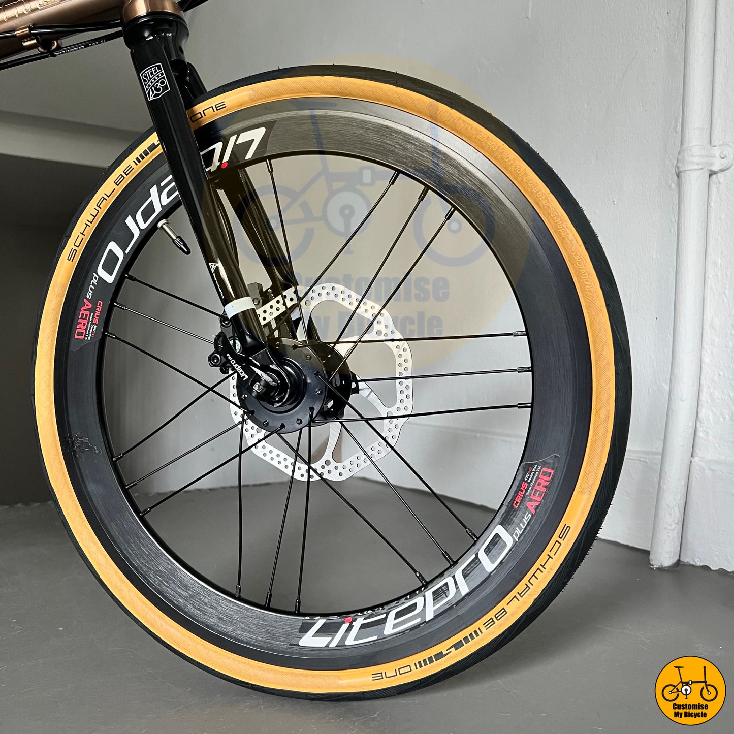 LItepro lightweight wheels on high-end foldie with a durable frame and top-tier Litepro components