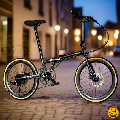 Matte Black Folding Bike With High Profile Wheels And Lightweight Alloy Frame  

