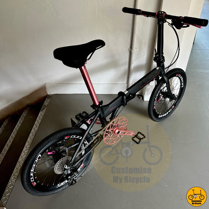 Basikal lipat Crius Master 9 kelajuan dengan rekaan feminin dan bingkai matte black