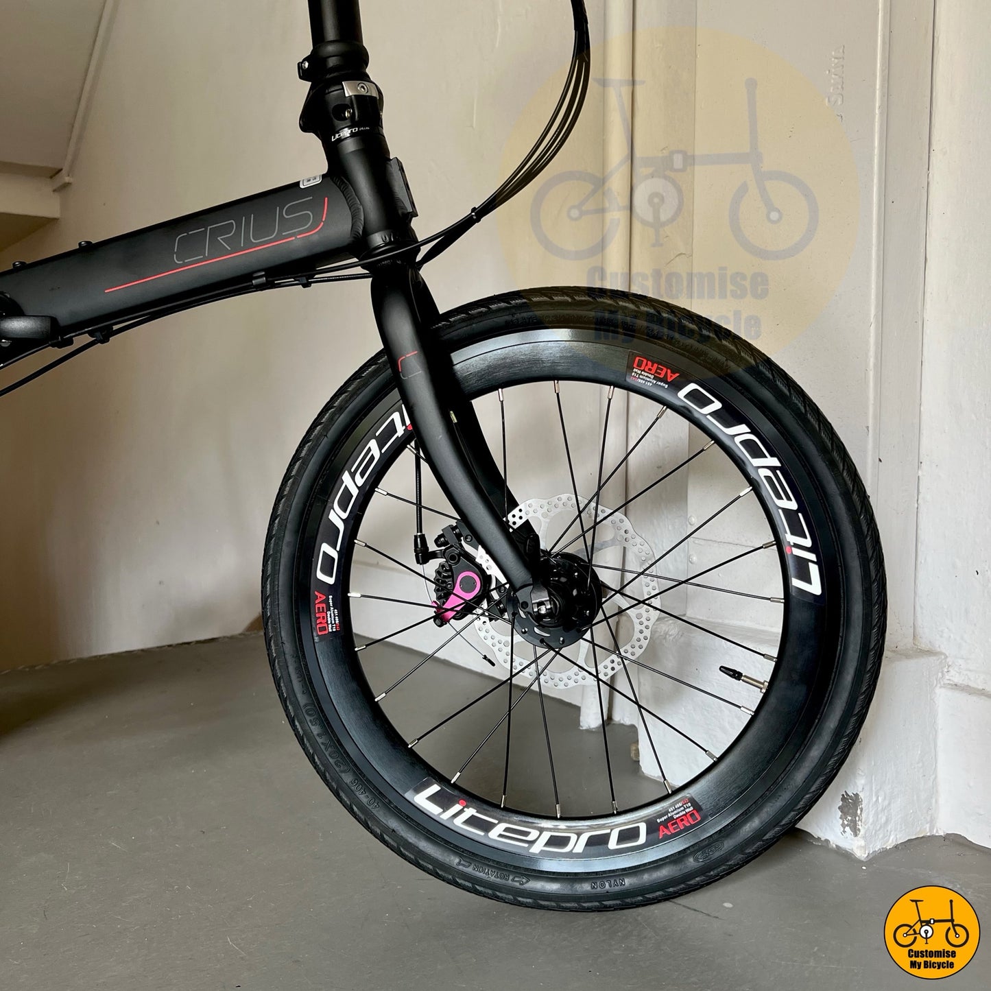 Folding bike for ladies with baby pink theme and Shimano gears
