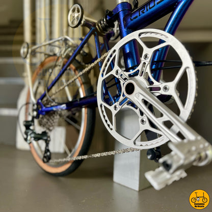 Premium blue frame folding bicycle with a vintage appeal
