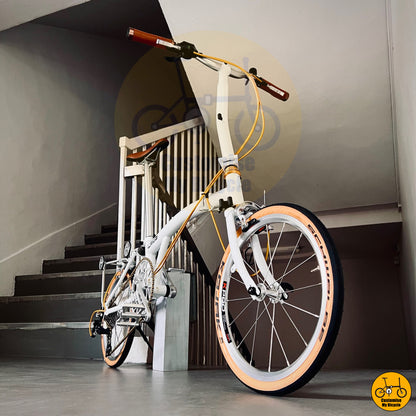 Crius Trifold 18-inch Classy Foldable Bike – White & Gold Finish with Sleek Build
