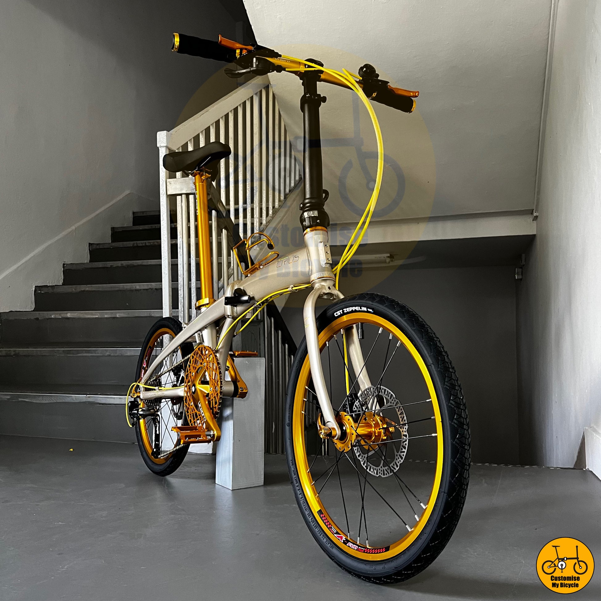 Compact and lightweight Crius Velocity 22-inch foldable bicycle with a premium gold finish