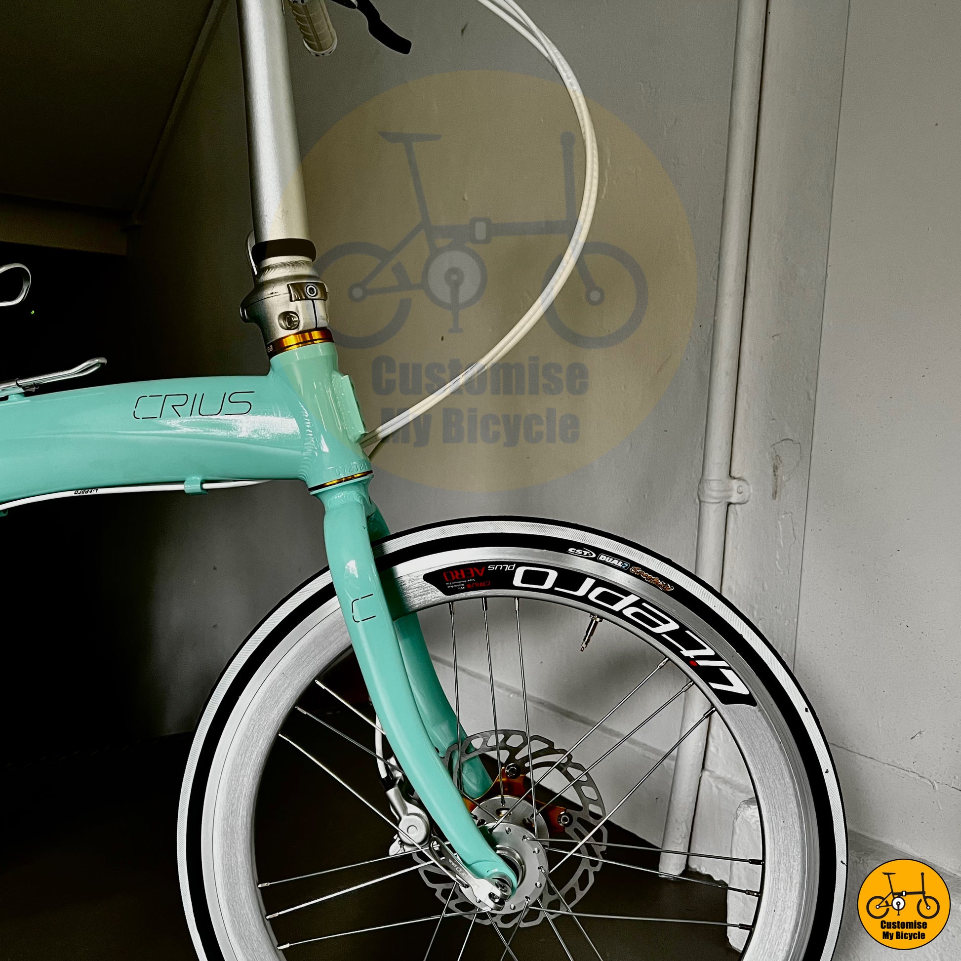 Bianchi Green Crius Velocity 22-inch Folding Bike on a city street
