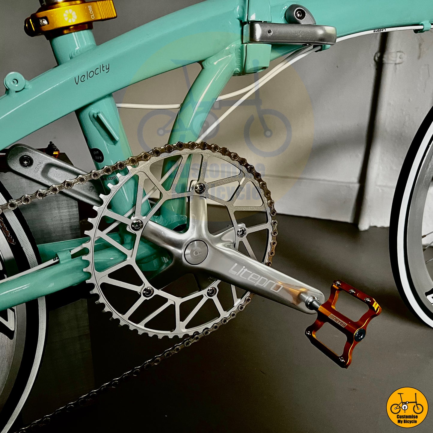 Gold Pedals on High-performance Crius Velocity 22-inch Foldable Bike with premium components
