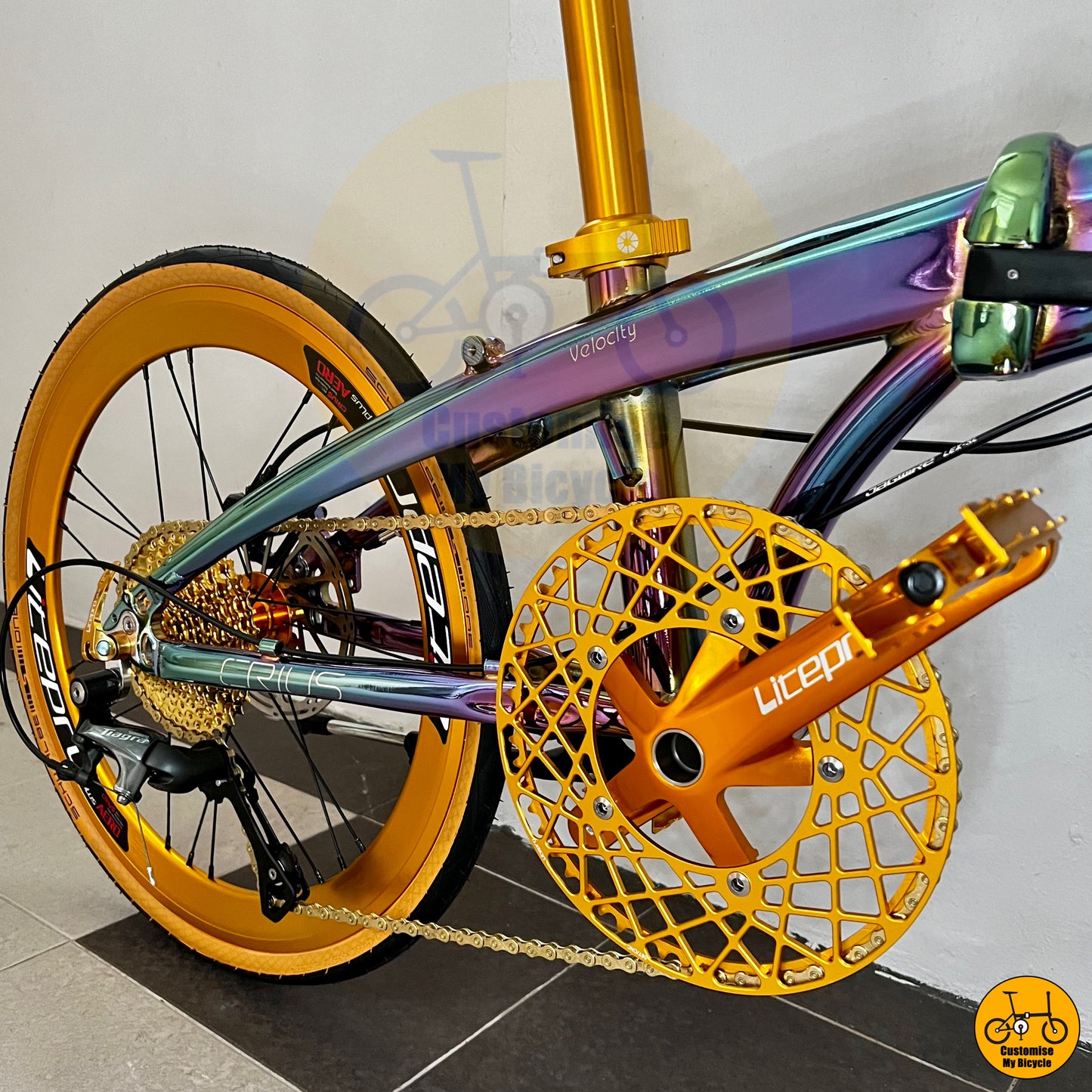 Compact folding bike featuring Litepro crankset and chainring
