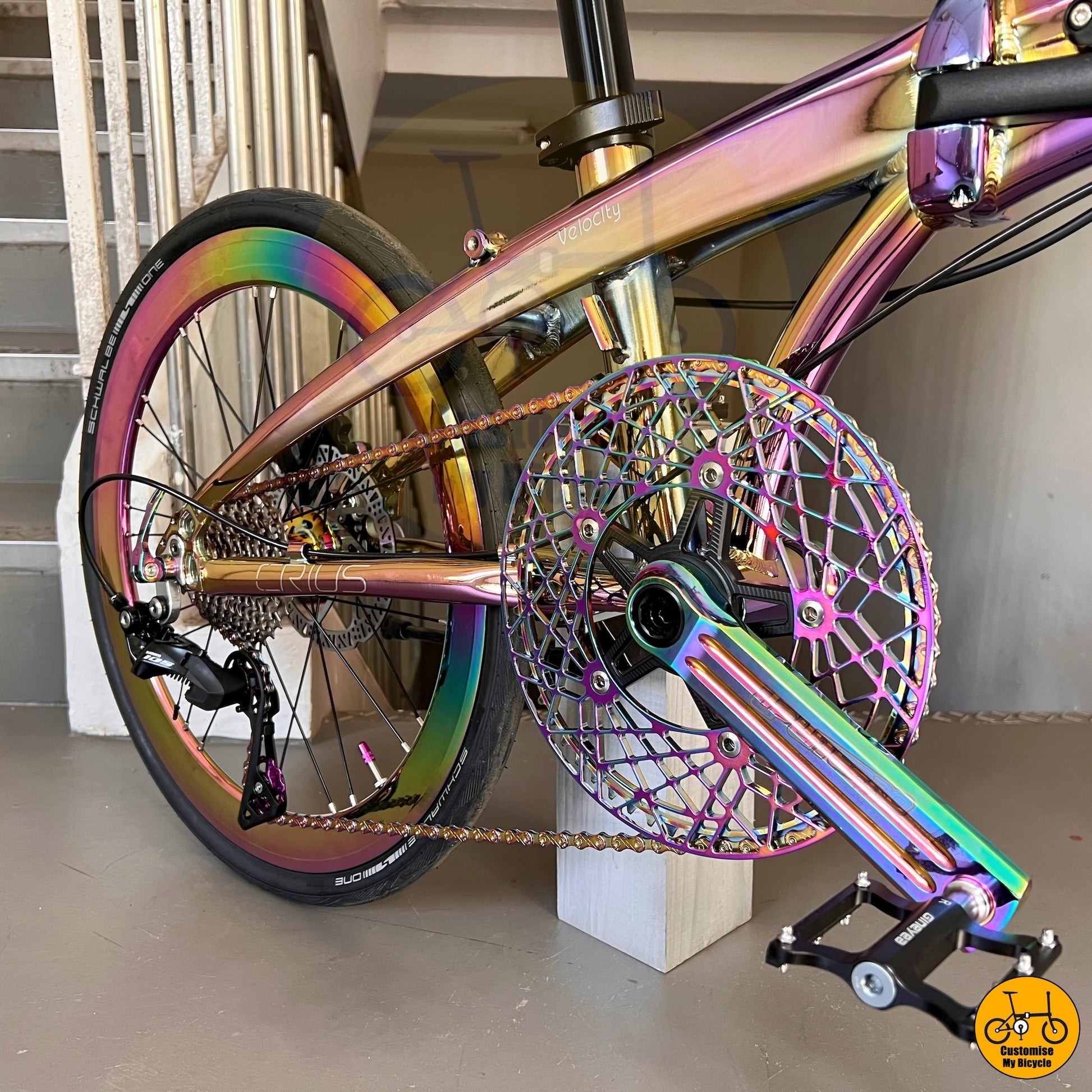 Close-up of the oil slick crankset and chainring for smooth power transfer
