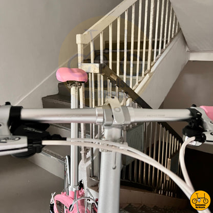 Baby pink foldable bike with reinforced frame and Litepro components
