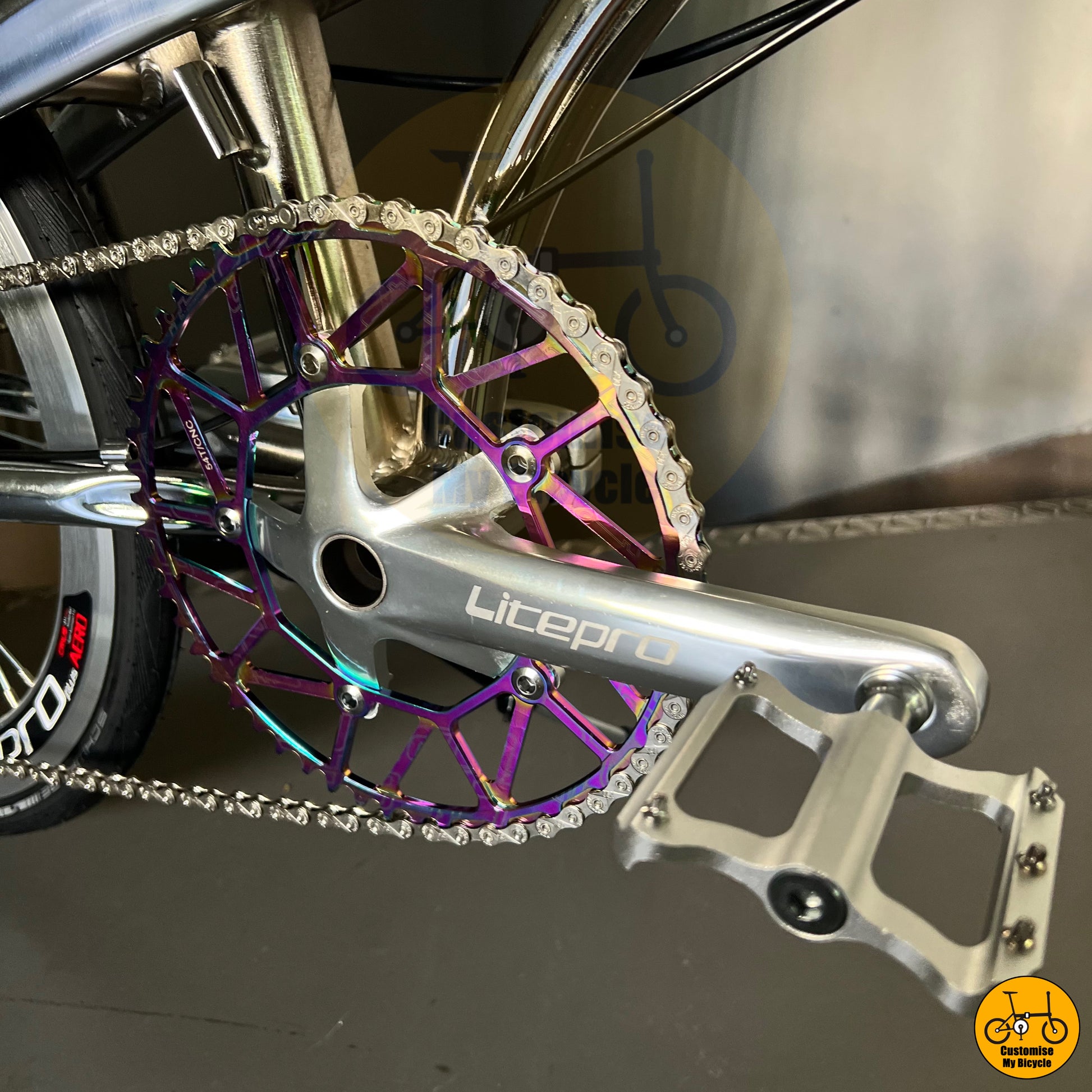Litepro crankset with an oil slick chainring for improved pedaling efficiency
