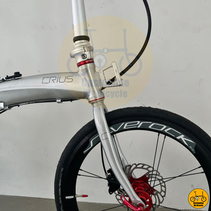 Lightweight foldable bicycle featuring a sleek silver finish and high-performance build
