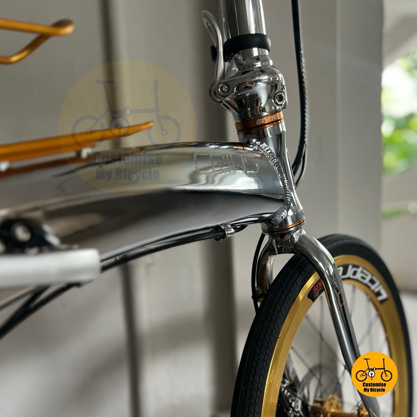 Chrome finish frame with gold accents