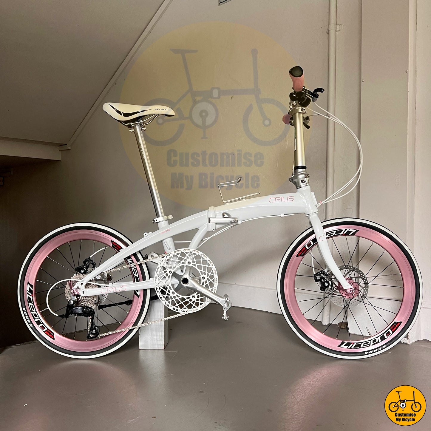 Crius Velocity 22-inch Folding Bike – Snow White Frame with Baby Pink Wheels
