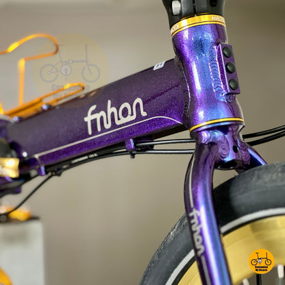 Chameleon Blue folding bike parked outdoor with LITEPRO Aero high wall wheels