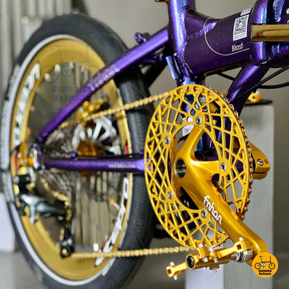 Gold FNHON Hollowtech crankset close up on lightweight folding bike