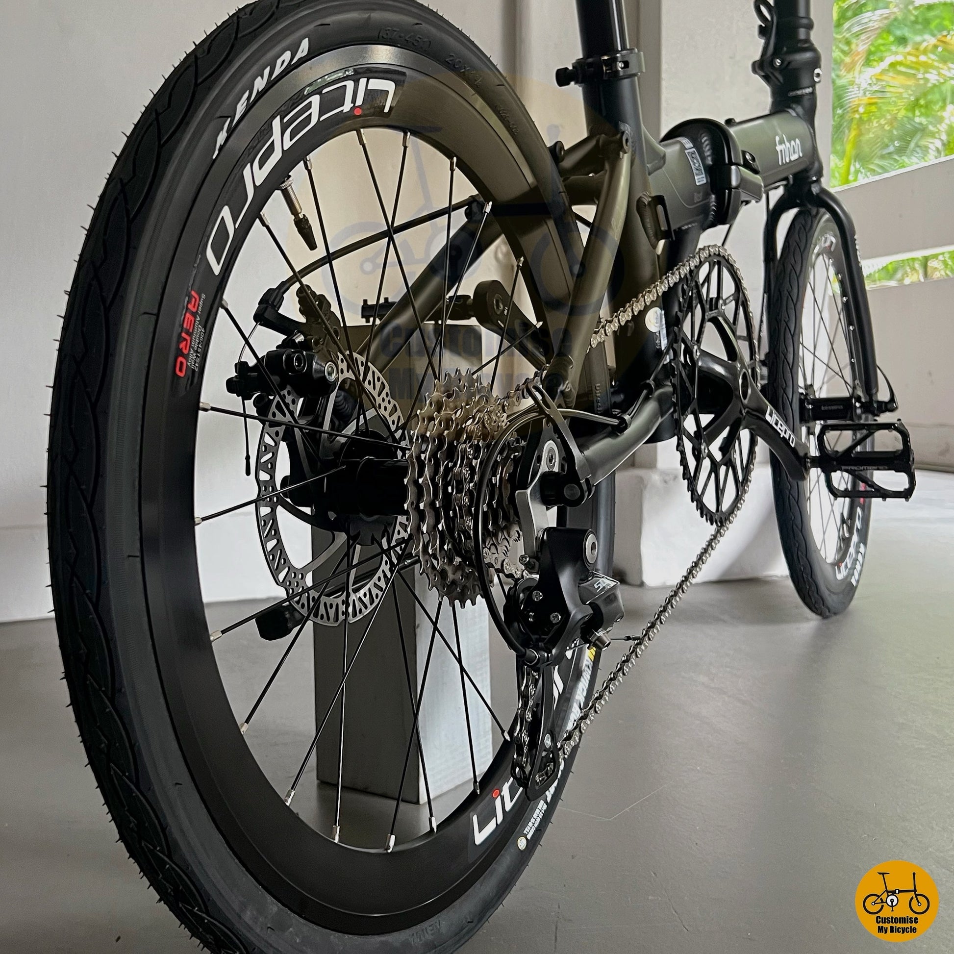 Sleek black folding bicycle for Singapore commuters
