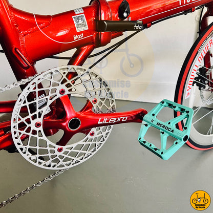 Meroca pedals on Premium Ruby Red Fnhon Blast 22-Inch Folding Bicycle – Smooth & Durable Design
