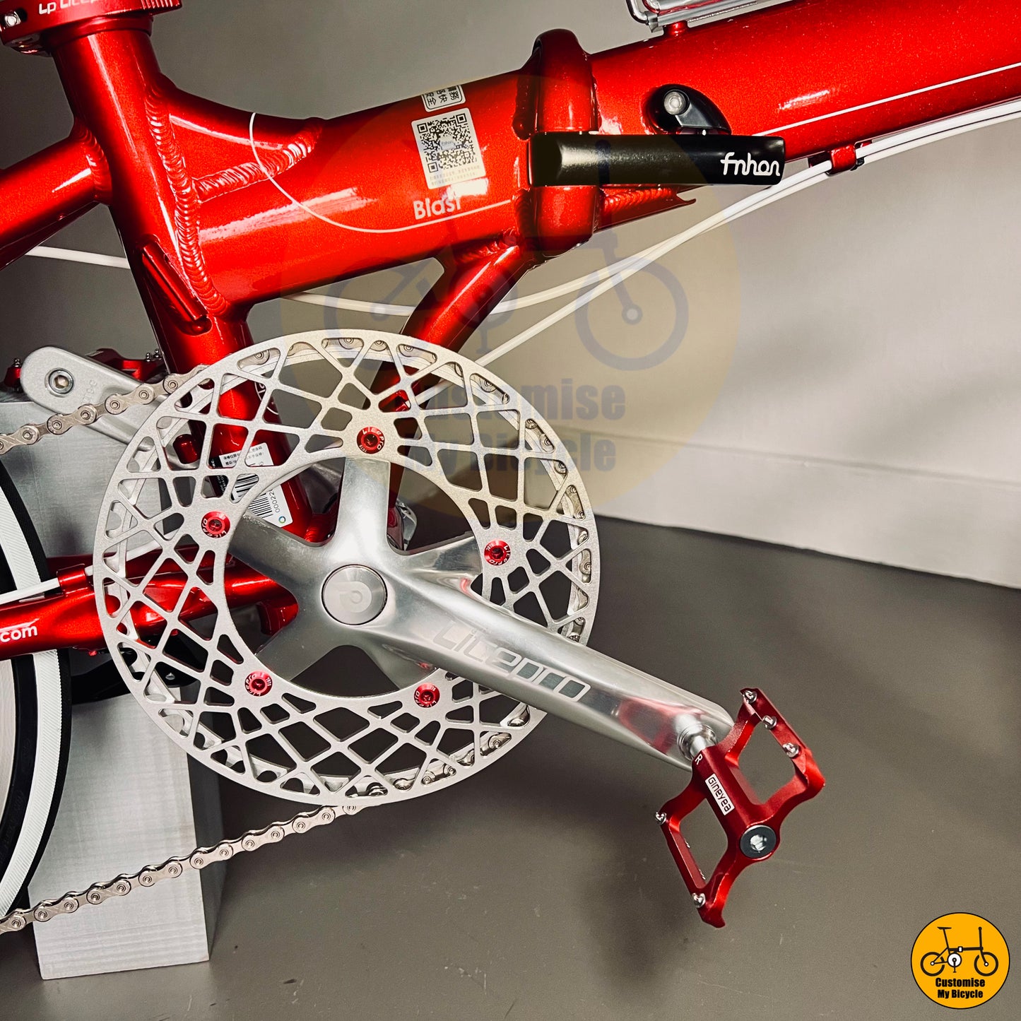 Red Litepro Chainring Bolts Nuts on Fnhon Blast 22-Inch Ruby Red Foldable Bicycle – Elegant and Performance-Driven
