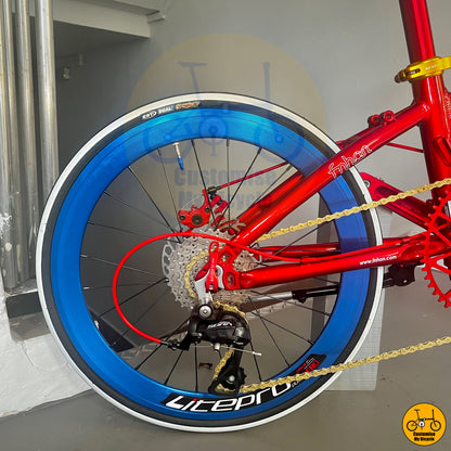 Blue Litepro wheel rim wheelset on Fnhon Blast 22” Folding Cycle – Eye-Catching Red, Blue & Gold Aesthetic
