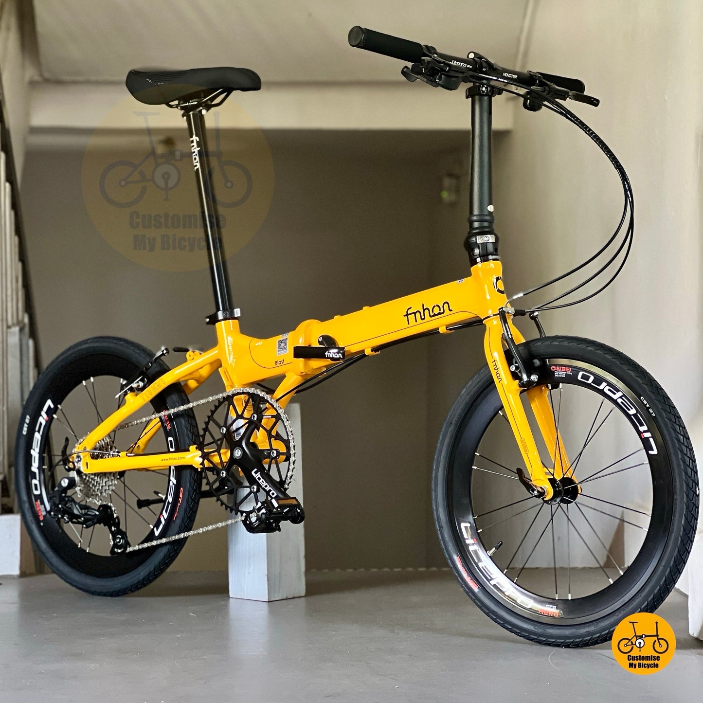 Basikal lipat Fnhon Blast kuning emas dengan gear Sensah 9 dan roda Litepro  
