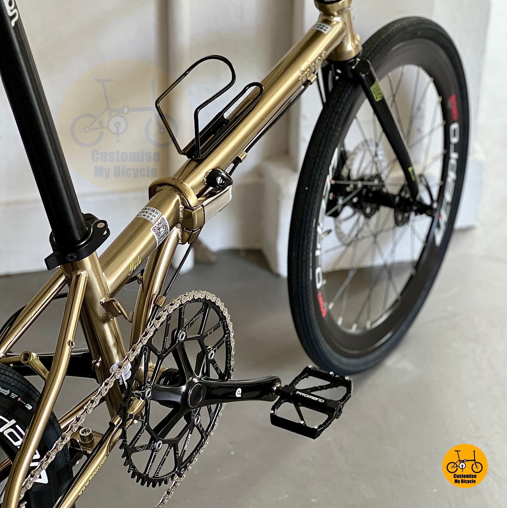 Low angle side shot highlighting Titanium Gold chromoly steel body frame
