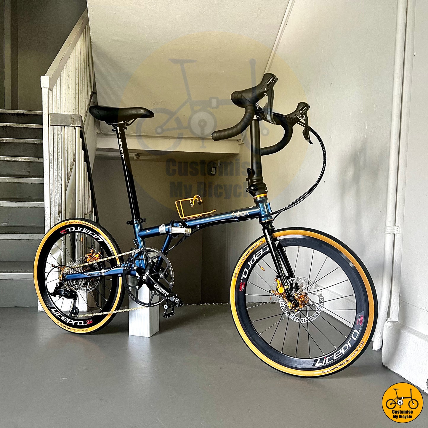 Deep sea blue Fnhon Gust 22-inch folding bike with drop bar setup
