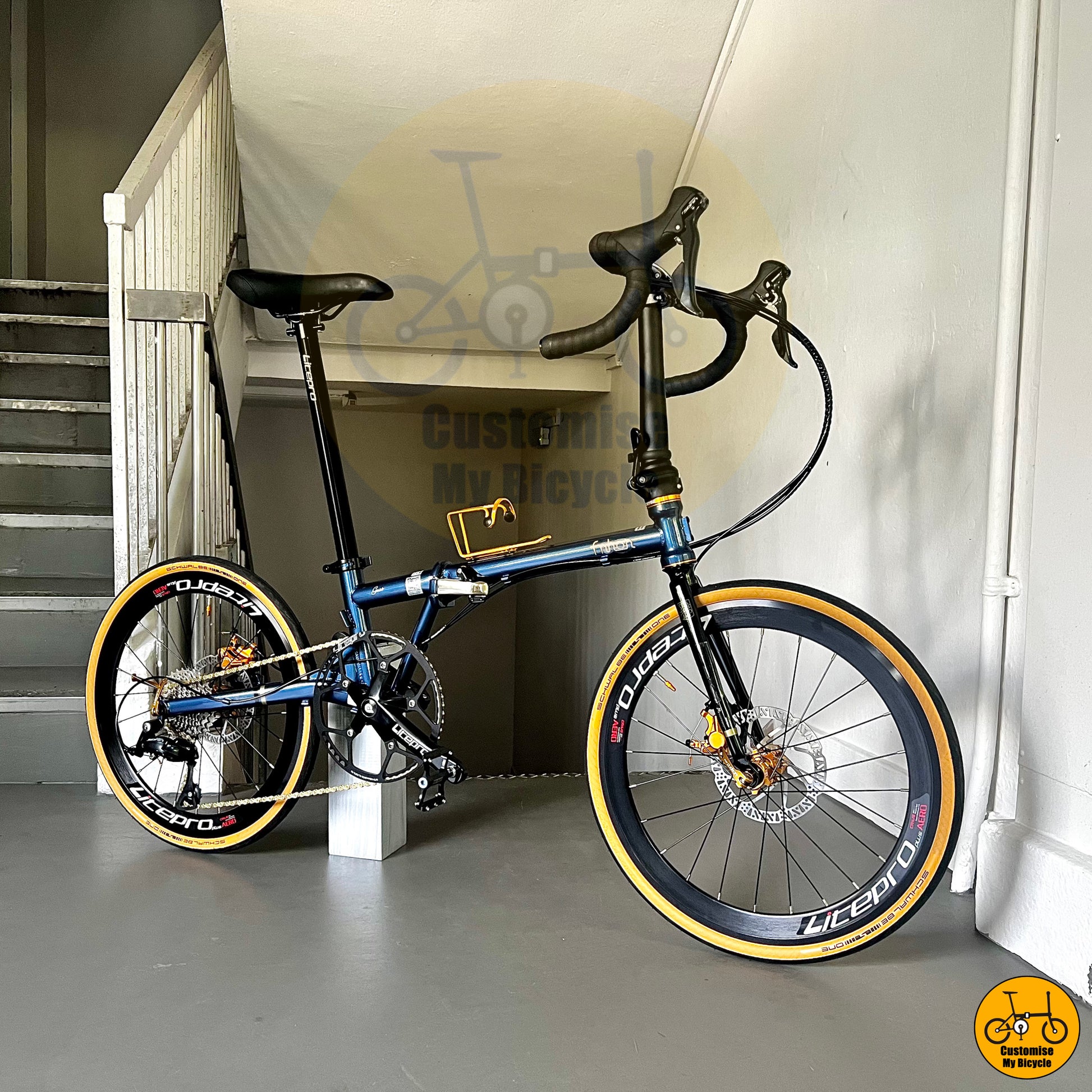 Deep sea blue Fnhon Gust 22-inch folding bike with drop bar setup
