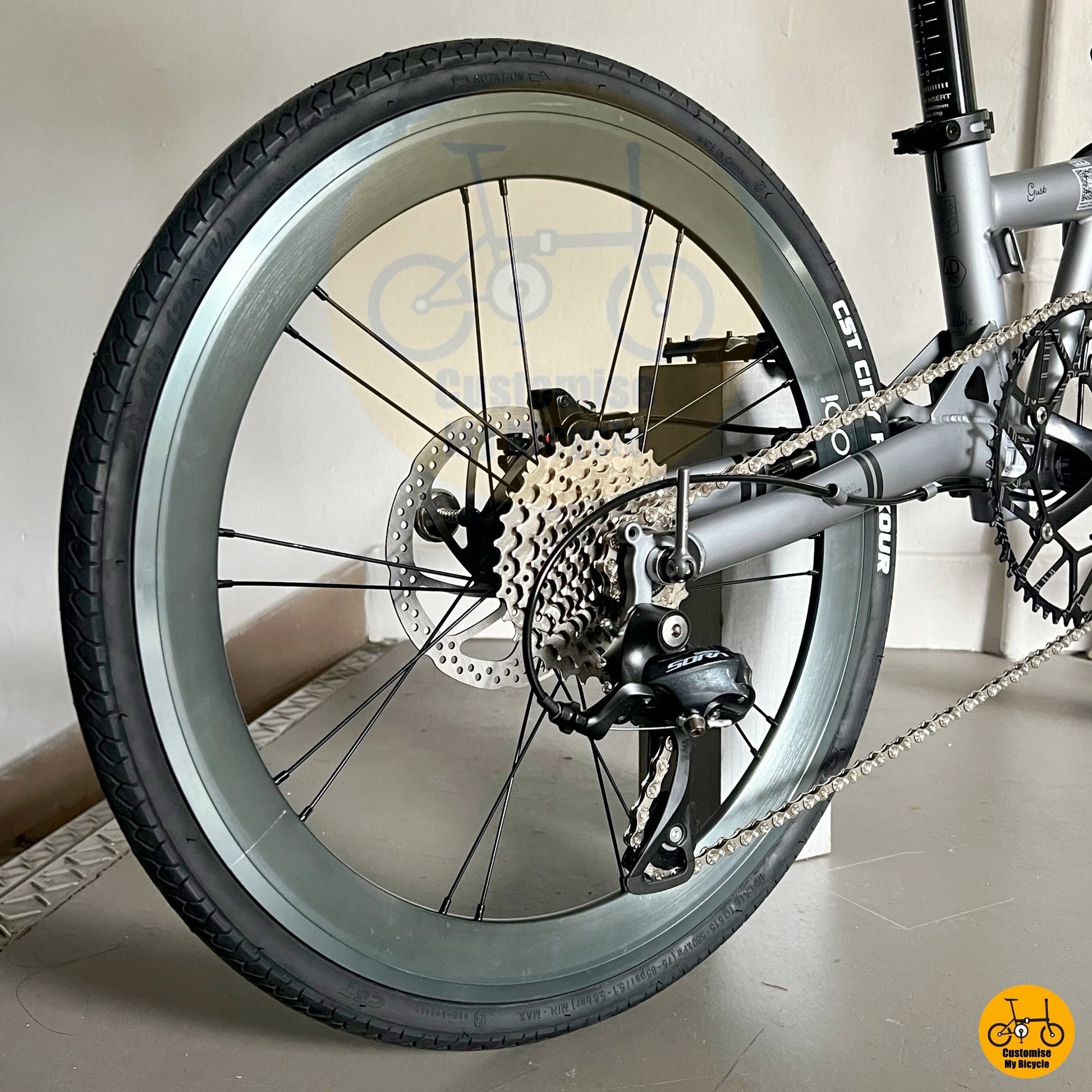 foldable bike with reinforced frame and custom wheels
