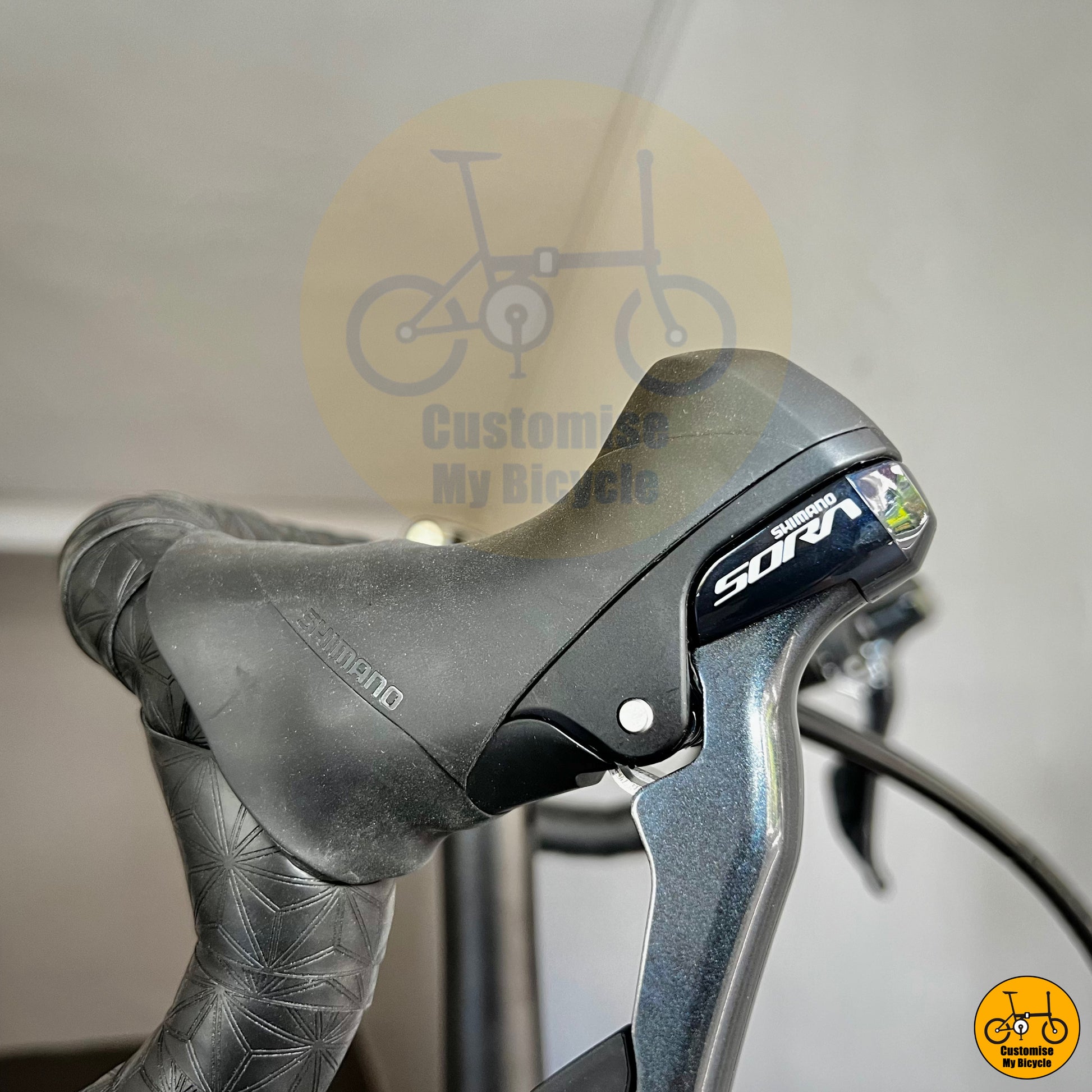 High-performance folding bike with a Shimano road groupset for speed
