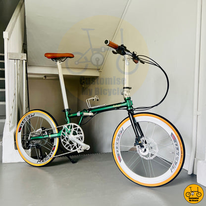 Emerald green Fnhon Gust 22-inch folding bike with clean retro design
