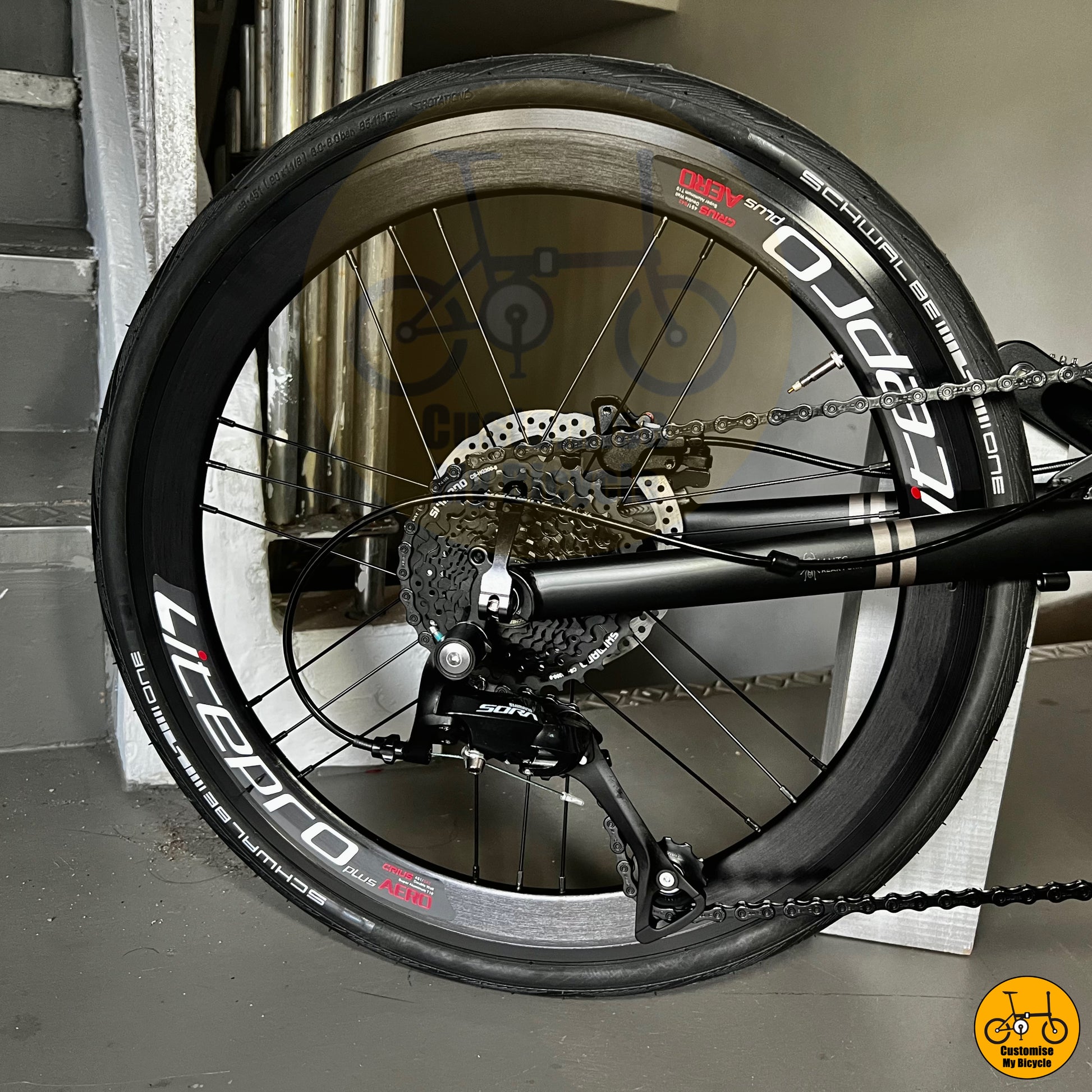 Matte black foldie with Litepro wheels for smooth city riding
