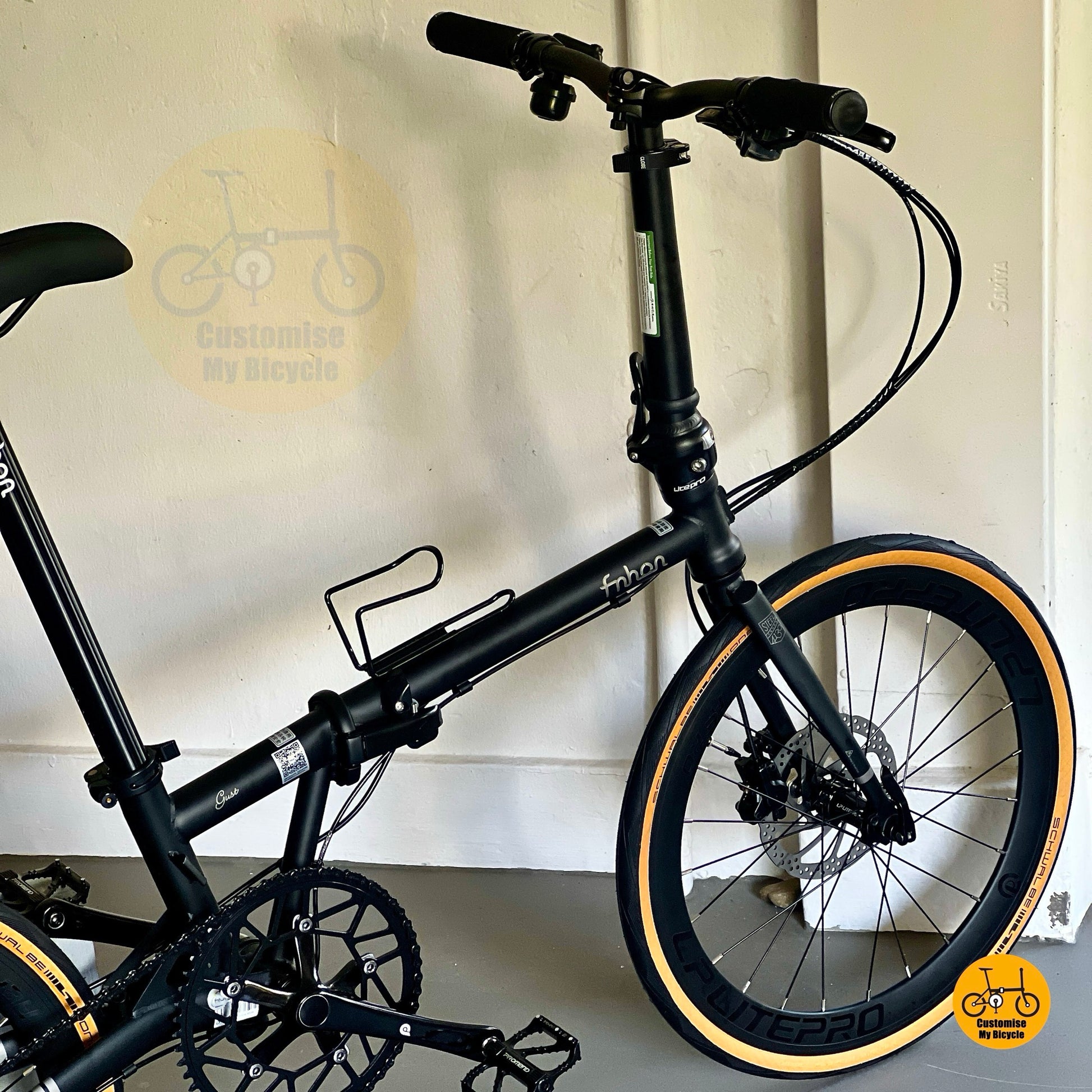 Folding bike with hydraulic disc brakes and high profile wheels  
