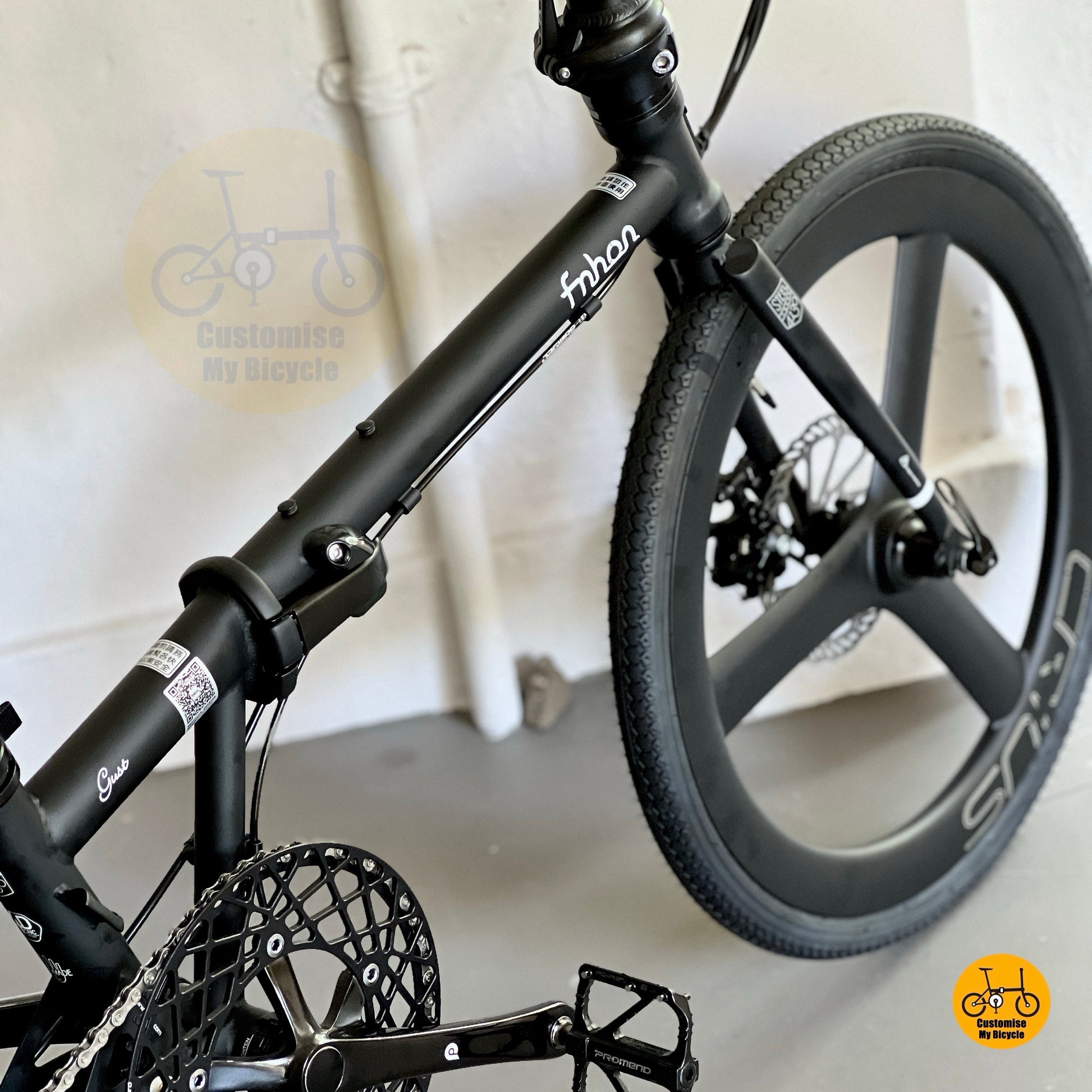 Front angle showing Crius carbon trispoke wheelset and disc brake setup
