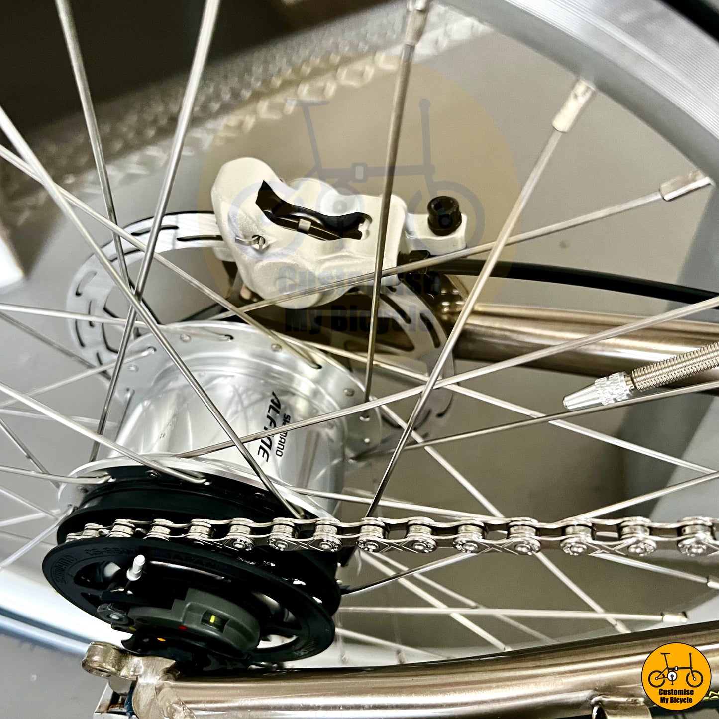 Titanium gold Fnhon Gust 20-inch folding bike with Shimano Alfine internal gear hub
