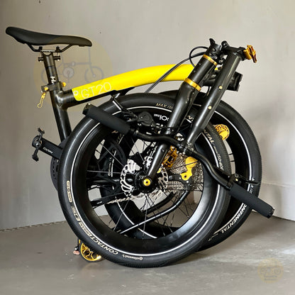 Fnhon GT20 Bumblebee 20 inch folding bicycle folded compactly showing the trifold design compact frame and easy transport configuration
