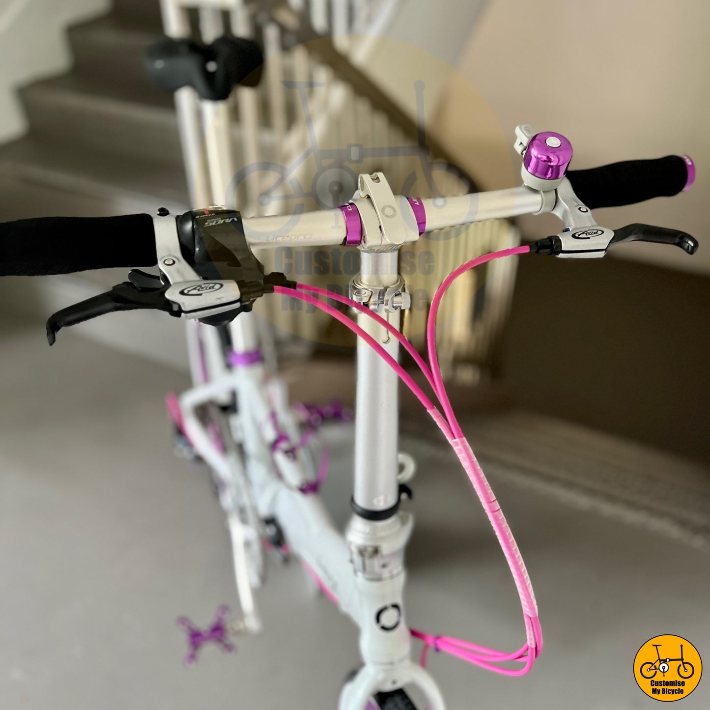 Cockpit Setup on Dreamy White & Purple Accents Fnhon Monsoon 22-Inch Folding Bike – A Stunning Design
