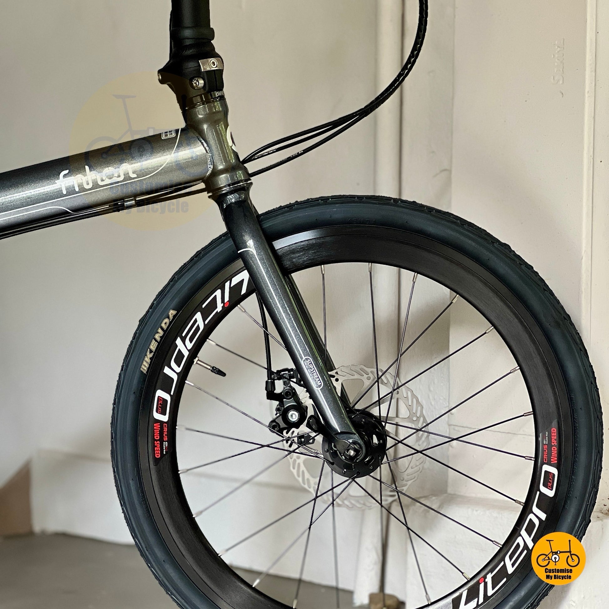 Front wheel close up showing Litepro Aero high profile rim and Kenda tyre  
