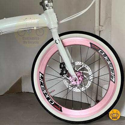 Front wheel close up showing Litepro Aero high profile rim in Soft Pink
