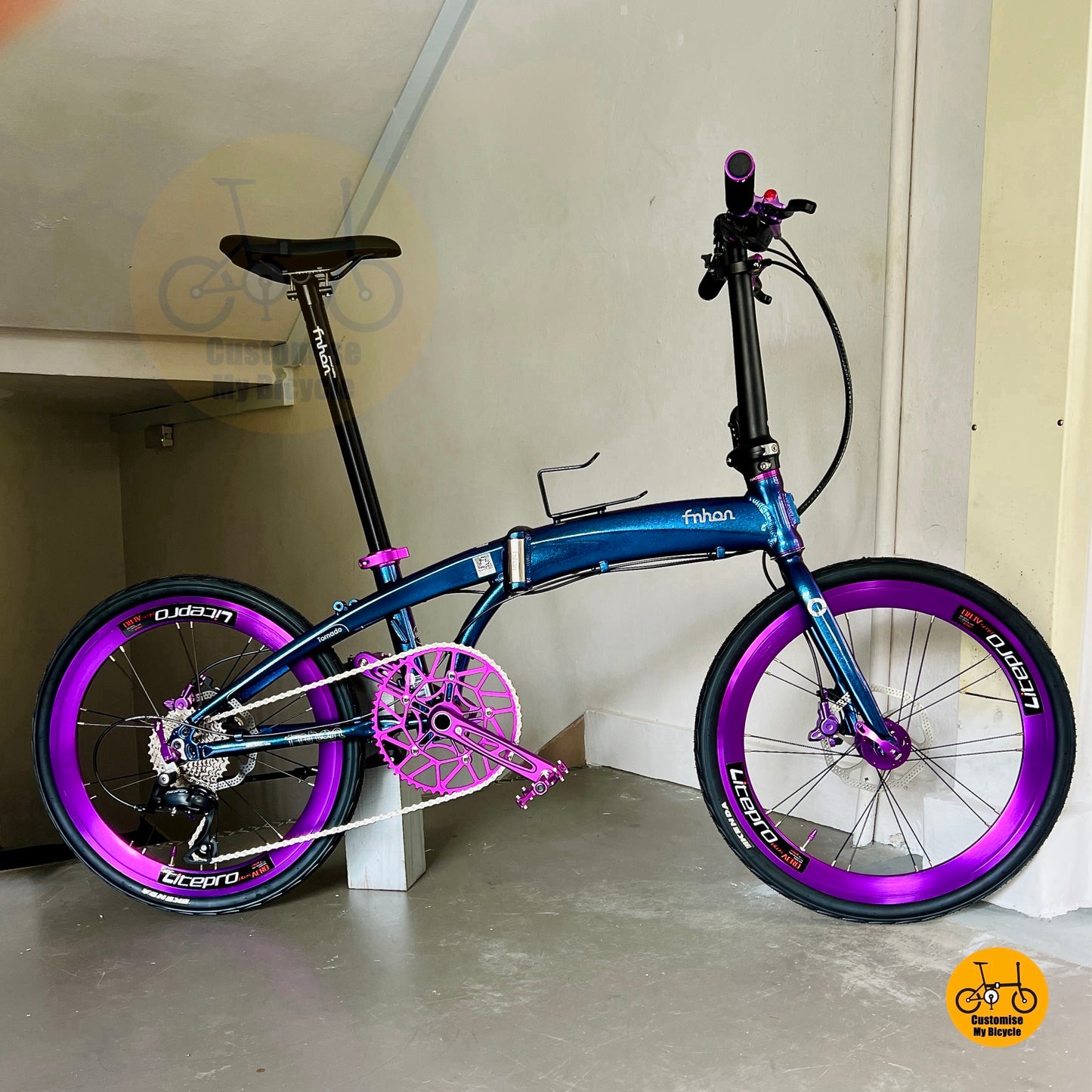 Chameleon Blue folding bike front high angle view with aerodynamic aluminium alloy body