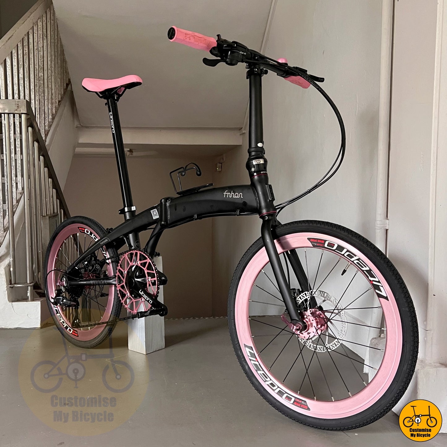 Baby Pink & Matte Black Foldie – Stylish & Compact for Female Riders
