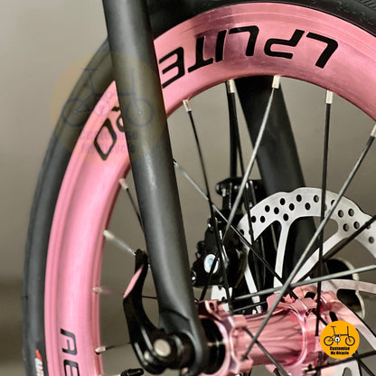 Lower front angle highlighting fork design and mechanical disc brake setup
