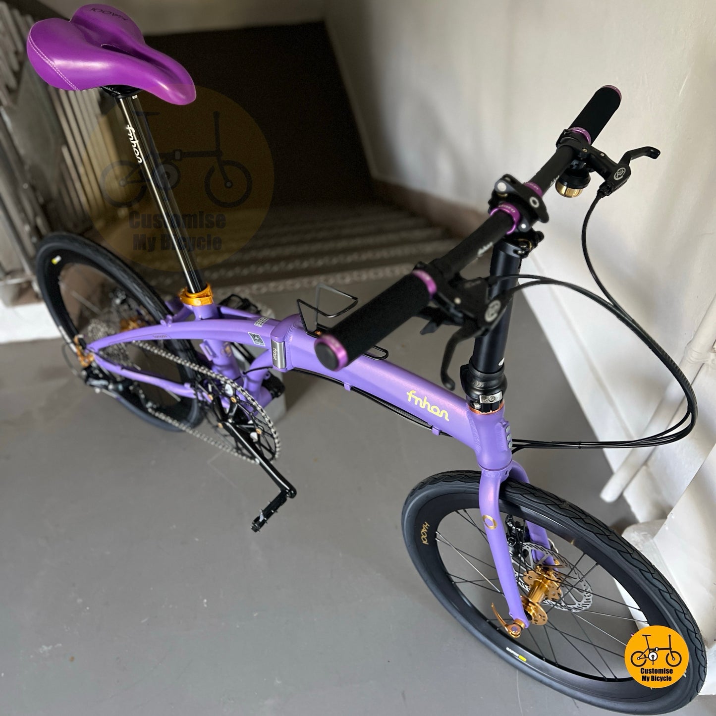 Customised purple comfy saddle on Fnhon Tornado  
