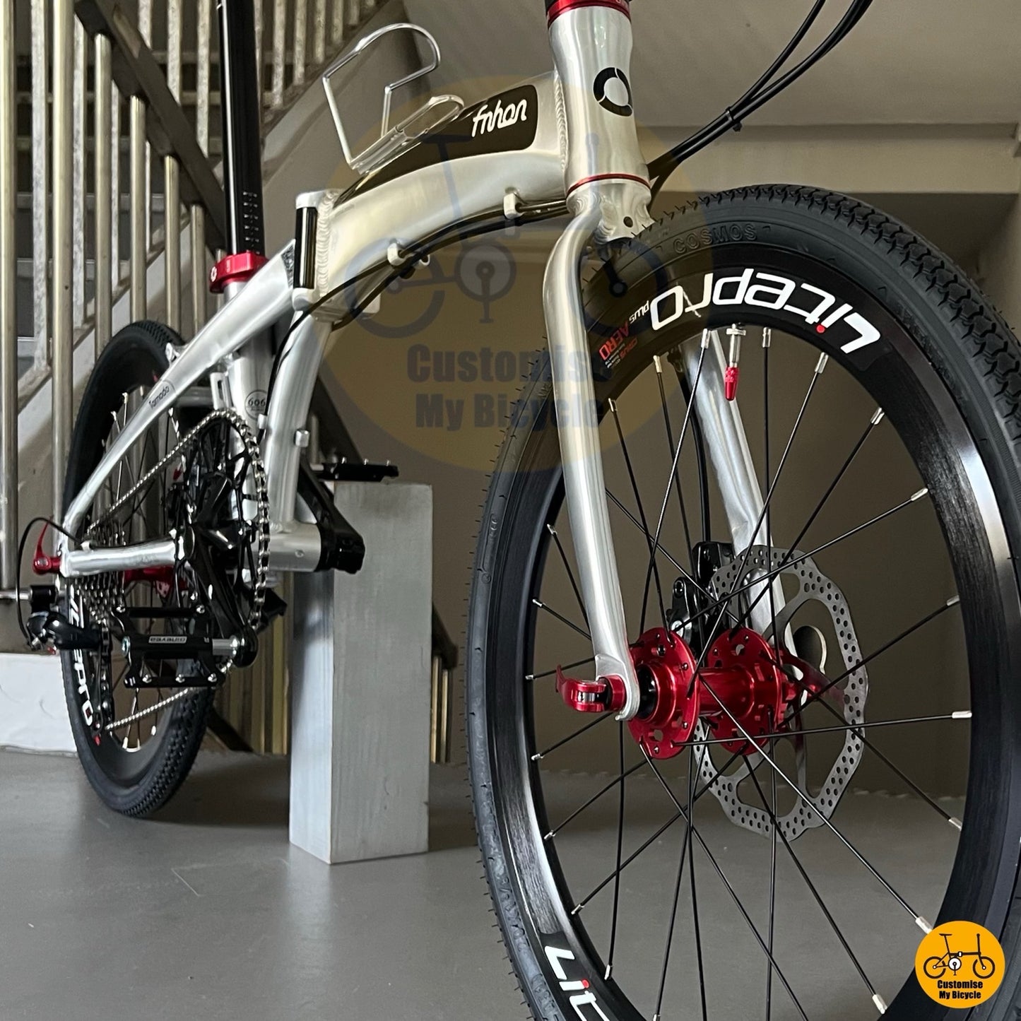 Red hub and black rim folding bicycle wheel
