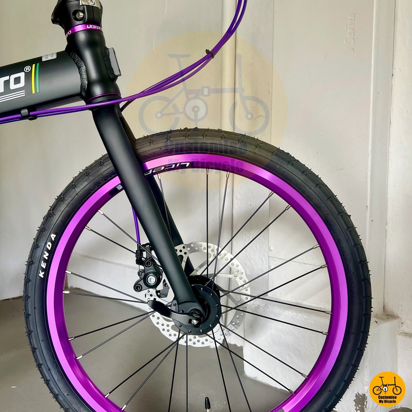 Purple accent wheels and crank on Litepro 20-inch foldable bike
