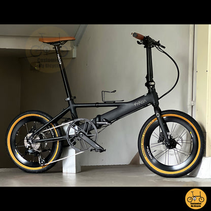 Fnhon Monsoon Mini 18" Matte Black folding bike in compact folded configuration