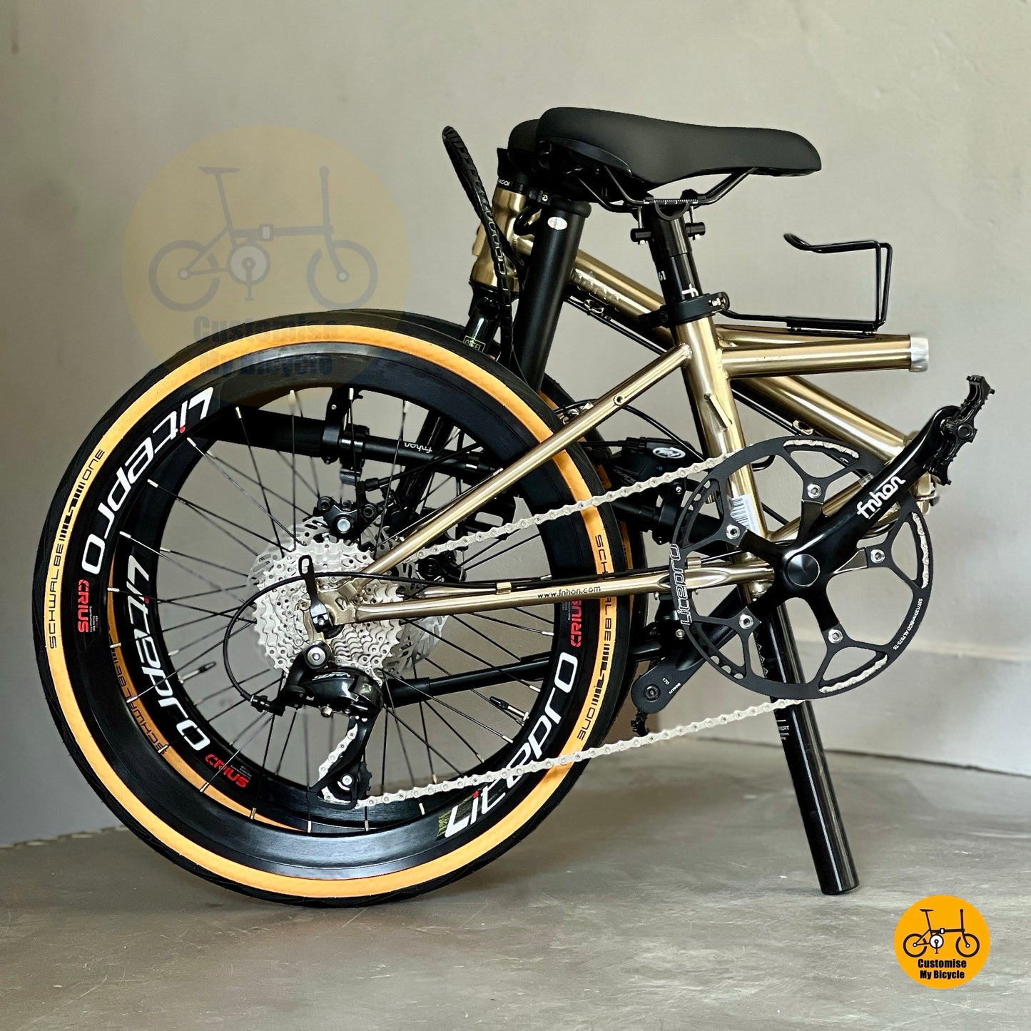 Basikal Lipat Fnhon Thunderstorm 22 Inci Warna Titanium Gold Shimano 9 Kelajuan Rangka Keluli Kukuh
